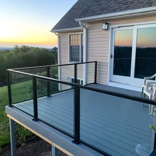 Composite Deck Railing Idea - Glass Panel Railing for Uninterrupted Views_2
