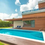 a villa swimming pool with deck