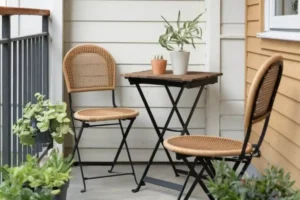 a balcony with a cozy coffee drinking nook