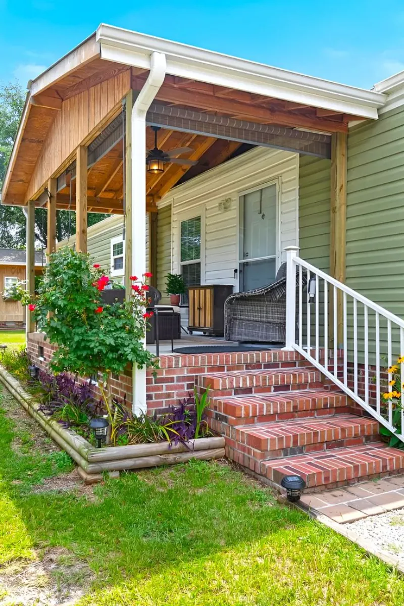 mobile home deck ideas with wooden roof and brick stairs