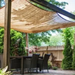 a patio with shade sail for privacy