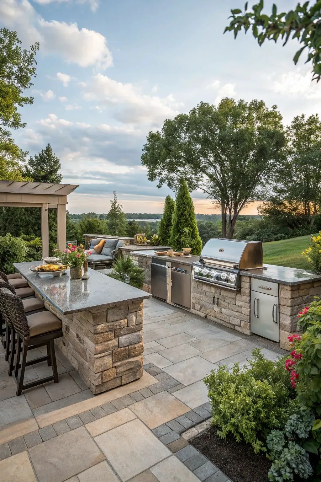 a stone patio with built-in outdoor kitchen